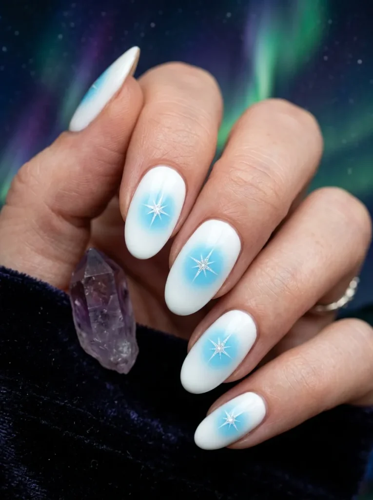 Minimalist white starbursts on midnight navy nails